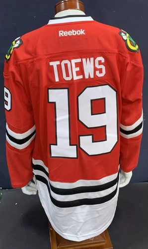 Jonathan Toews Chicago Blackhawks Size L Captain Reebok Jersey NHL Licensed