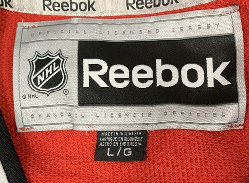 Jonathan Toews Chicago Blackhawks Size L Captain Reebok Jersey NHL Licensed