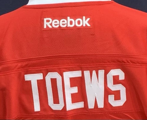 Jonathan Toews Chicago Blackhawks Size L Captain Reebok Jersey NHL Licensed