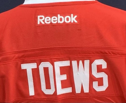 Jonathan Toews Chicago Blackhawks Size L Captain Reebok Jersey NHL Licensed