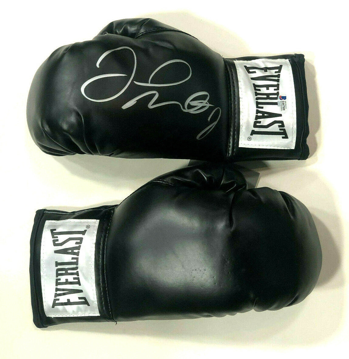 Floyd Mayweather signed black Everlast boxing glove pair auto Beckett BAS COA