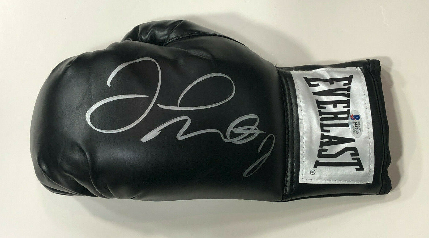 Floyd Mayweather signed black Everlast boxing glove pair auto Beckett BAS COA