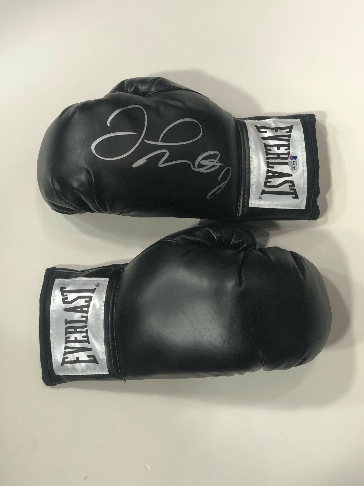 Floyd Mayweather signed black Everlast boxing glove pair auto Beckett BAS COA