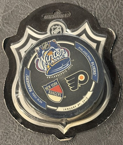 2012 WINTER CLASSIC NEW YORK RANGERS vs FLYERS Game Puck New Factory Sealed Mint