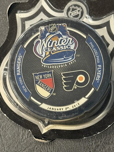 2012 WINTER CLASSIC NEW YORK RANGERS vs FLYERS Game Puck New Factory Sealed Mint