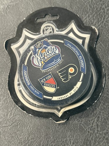 2012 WINTER CLASSIC NEW YORK RANGERS vs FLYERS Game Puck New Factory Sealed Mint