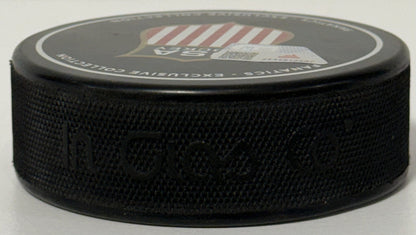 Connor Hellebuyck Signed Team USA 2026 Olympic Hockey Puck Gold Medal Fanatics